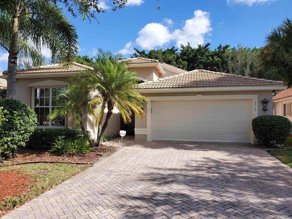 Photo of 7716 Coral Colony Way Way, Lake Worth Beach, FL 33467 (MLS # R10763279)