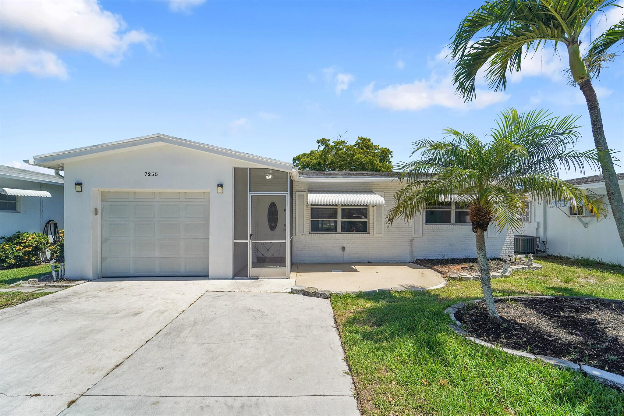Welcome to this well-maintained 2-bedroom, 2-bath home with a 1-car garage in Paradise Gardens Section 4. Features include a spacious bonus room off the family room with a private entrance, tile floors throughout, an updated kitchen with new appliances, and renovated bathrooms. The layout offers comfortable living and is perfect for entertaining. Located in a 55+ community with a clubhouse and pool. Centrally situated in Margate near shopping, restaurants, and major roads. Move-in ready and full of value. HOA requires Min 700 credit score.