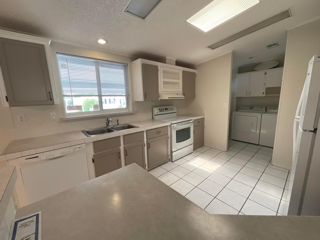 Photo of 827 Sunglow Street, Boynton Beach, FL 33436 (MLS # B26060924)
