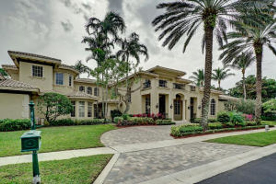 ONE OF A KIND, ELEGANT & SOPHISTICATED LAKEFRONT DBL LOT WITH ONE OF LARGEST POOL AREAS IN WCC, SOUTHERN EXPOSURE, IMPACT GLASS, CLASSICAL ESTATE HAS BEEN UPDATED & REMODELED BY DESIGNER ZELDA STRUCK IN A SOPHISTICATED ELEGANT METROPOLITAN STYLE. SEE ADDN8 BDRMS, 7 1/2 BATHS W/ LOFT, OFFICE, CLUB RM, MSTR SUITE HAS SITTING RM, WALNUT CONTEMPORARY BLT-INS W/ FLAT SCREEN TV, MSTR BATH UPDATED IN RITZ CARLTON STYLE, MARBLE VANITY TOPS, WALNUT PLANK FLOORING & MRBL THRU-OUT. ENTER THROUGH ELEGANT ARCHED FOYER W/ GRAND STAIRCASE LEADING TO UPSTAIRS W/ 3 BDRMS ENSUITE, OFFICE & LOFT. LIVING RM OVERLOOKS TROPICAL OASIS INFINITY-EDGED POOL, LIV RM HAS ELEGANT MRBL FIREPLACE, VENETIAN PLASTER WALLS, WALNUT FLOORS & 22 FT CEILINGS COMPLETE W/ ELEGANT SERVING AREA W/ ROSEWOOD CABS & ONYX BUFFET.