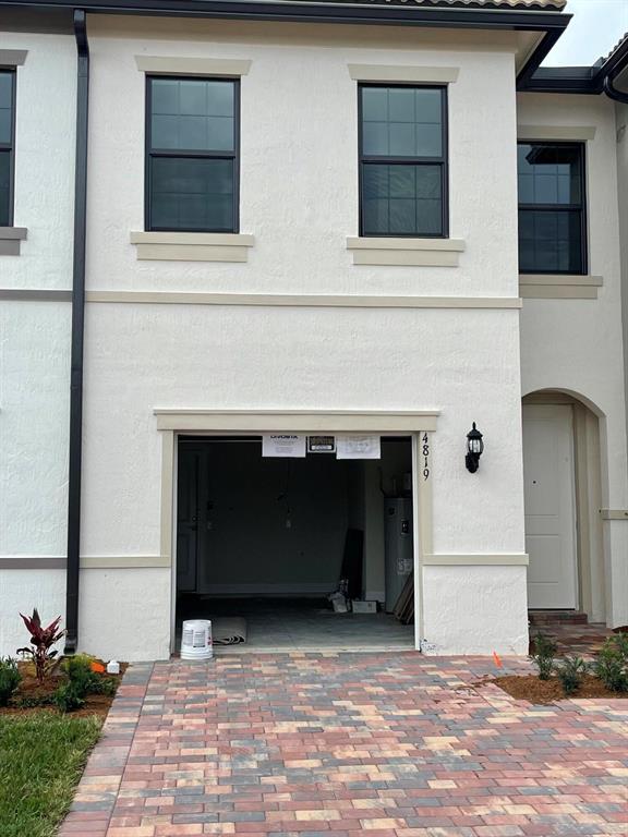 Photo of 4819 Indio Trail Trl, Lake Worth Beach, FL 33467 (MLS # R10763945)