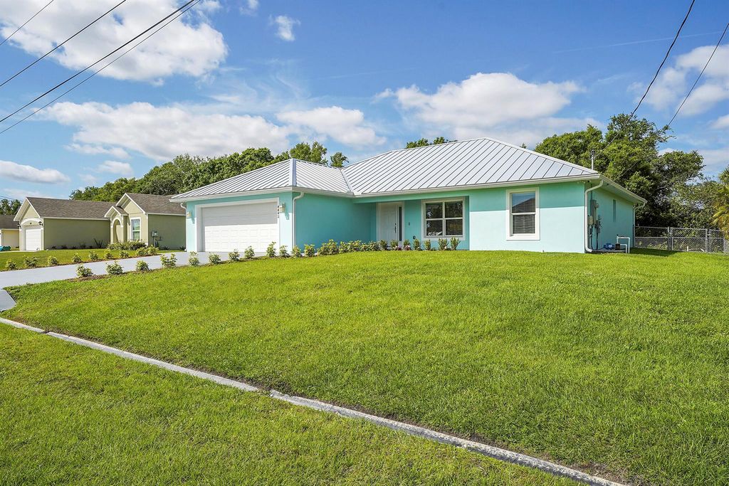 Photo of 4442 SW Paley Road, Port Saint Lucie, FL 34953 (MLS # R10971499)