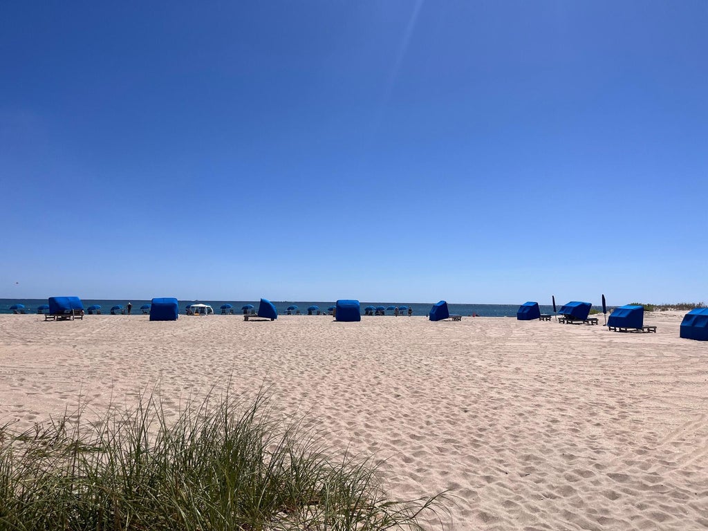 Photo of 2800 N Ocean Drive #A12b, Singer Island, FL 33404 (MLS # B26050046)