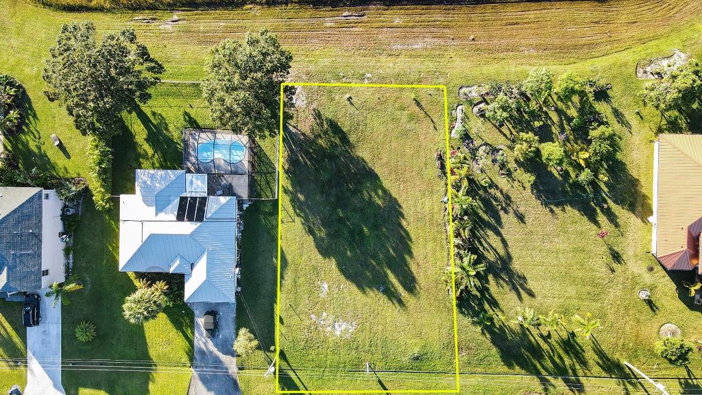 Photo of 5846 NW Mesa Circle, Port Saint Lucie, FL 34986 (MLS # R11039932)