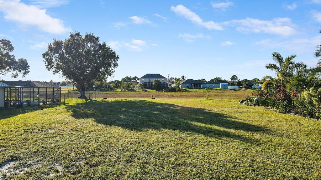 Photo of 5846 NW Mesa Circle, Port Saint Lucie, FL 34986 (MLS # R11039932)