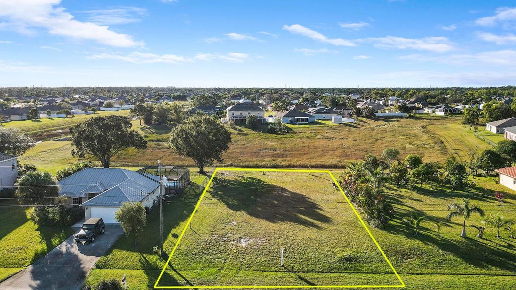 Photo of 5846 NW Mesa Circle, Port Saint Lucie, FL 34986 (MLS # R11039932)