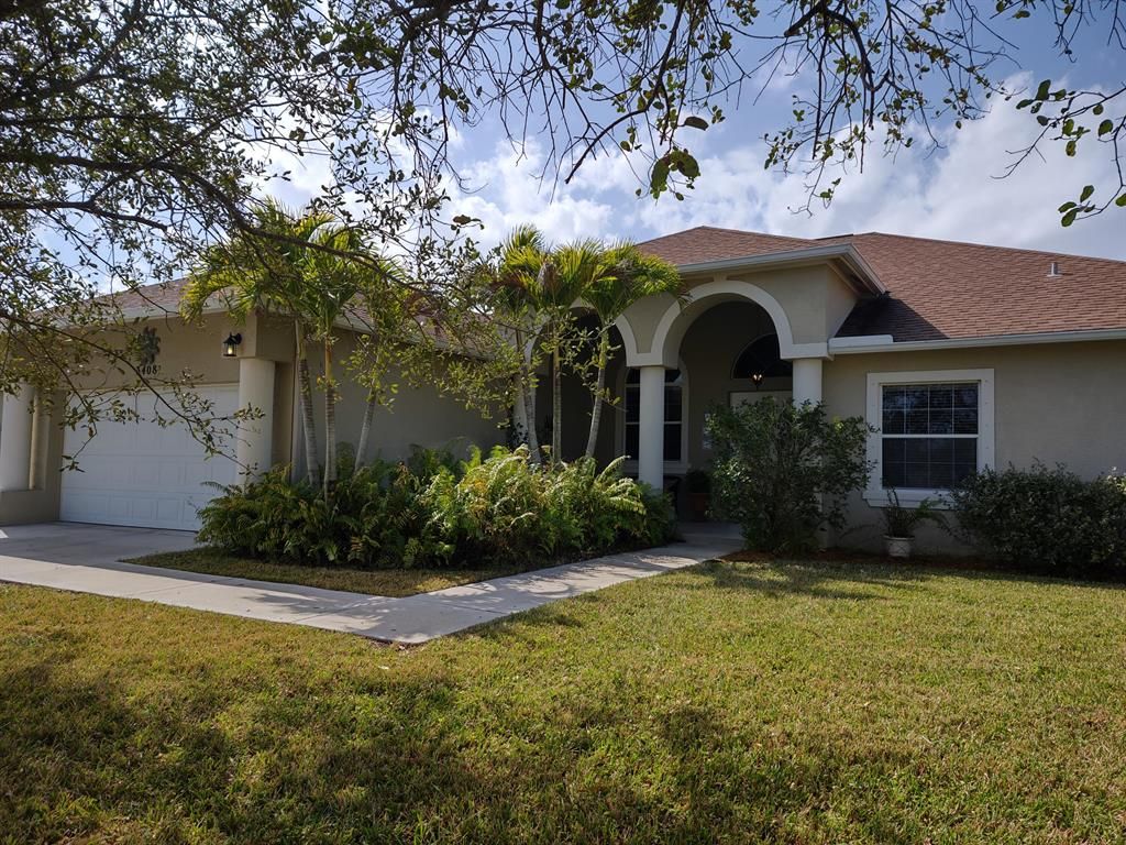 Photo of 3408 SE Bevil Avenue, Port Saint Lucie, FL 34984 (MLS # R10691312)