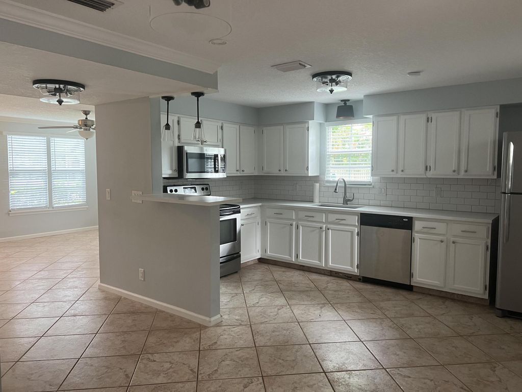 Photo of 300 Georgian Park Drive, Jupiter, FL 33458 (MLS # R11015335)