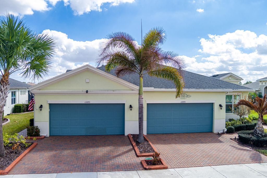Photo of 12893 SW Lake Fern Circle, Port Saint Lucie, FL 34987 (MLS # R11164060)