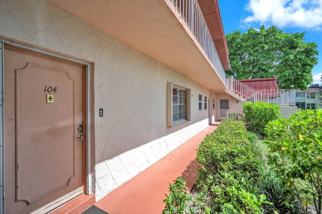 Photo of 12025 W Greenway Drive #104, Royal Palm Beach, FL 33411 (MLS # F10523581)