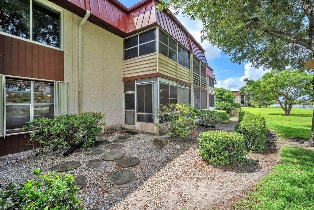 Photo of 12025 W Greenway Drive #104, Royal Palm Beach, FL 33411 (MLS # F10523581)