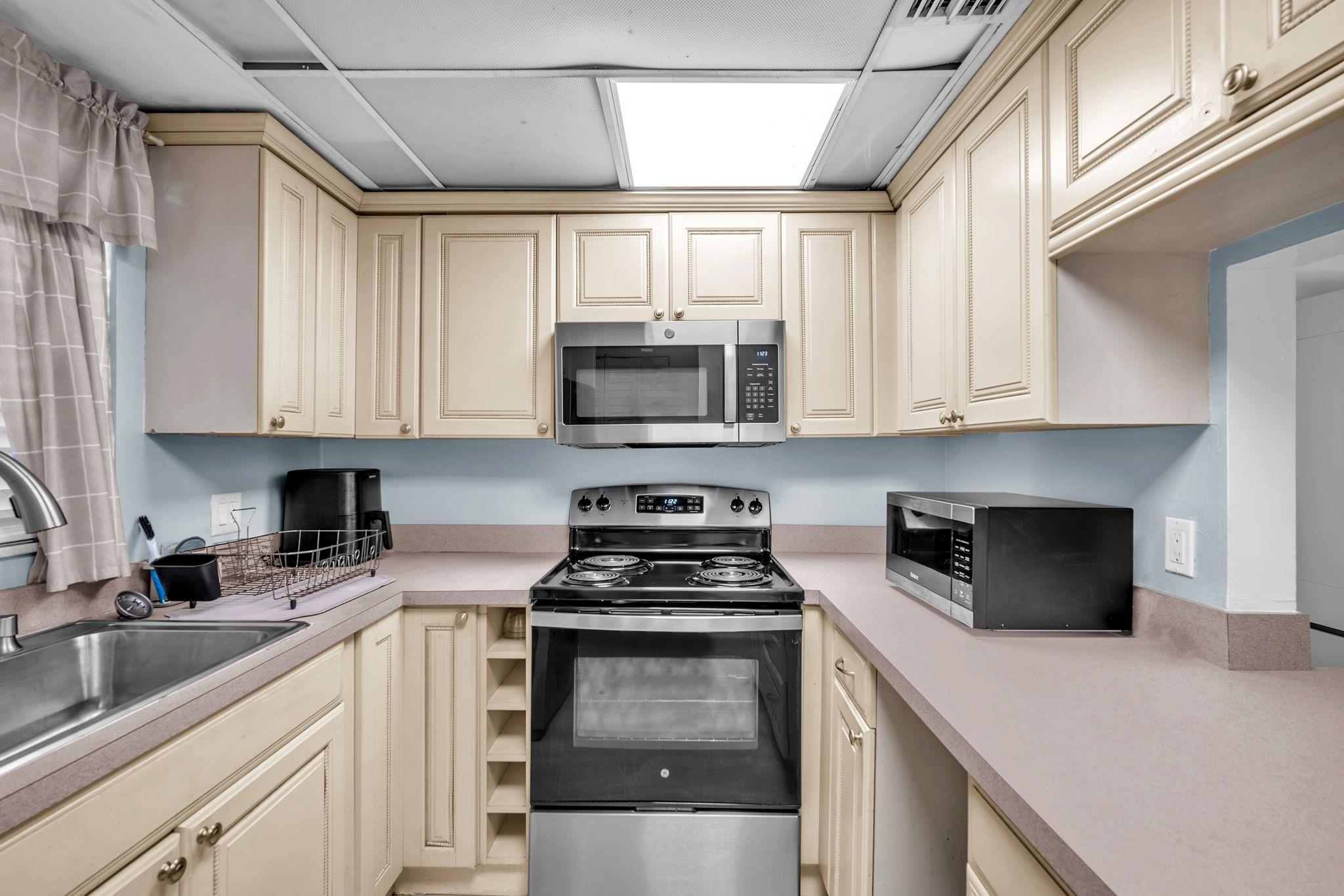 The welcoming community offers resort-style amenities, including a pool, clubhouse, and shuffleboard courts, perfect for staying active and social. Plus, your HOA fee simplifies life by covering maintenance, insurance, utilities, and more. All this within 1,088 sq ft of thoughtfully designed space—listed at $160K—this move-in-ready gem blends comfort, convenience, and community. Relax on your private screened lanai overlooking a tranquil canal
Laminate flooring throughout and tastefully remodeled bathrooms featuring tile and granite finishes. The A/C unit was updated in 2018. Community perks include a pool, clubhouse, shuffleboard courts and more! Schedule a showing today!