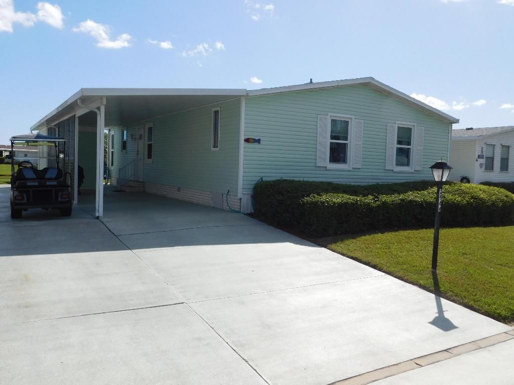 Photo of 2966 Fiddlewood Circle, Port Saint Lucie, FL 34952 (MLS # R10975779)