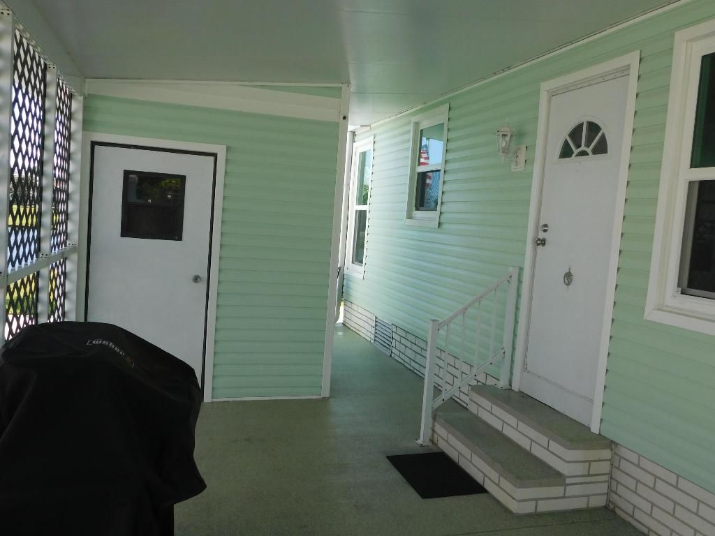 Photo of 2966 Fiddlewood Circle, Port Saint Lucie, FL 34952 (MLS # R10975779)