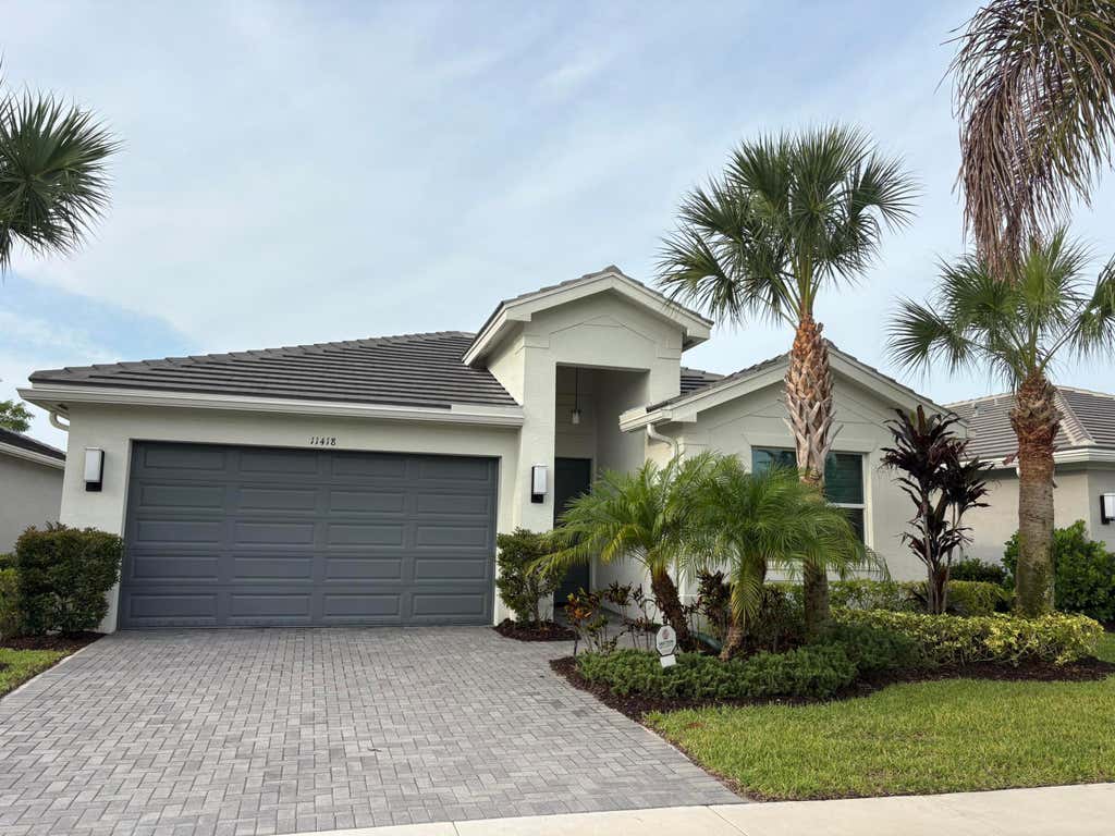 Photo of 11418 SW HAWKINS Terrace, Port Saint Lucie, FL 34987 (MLS # B26057701)