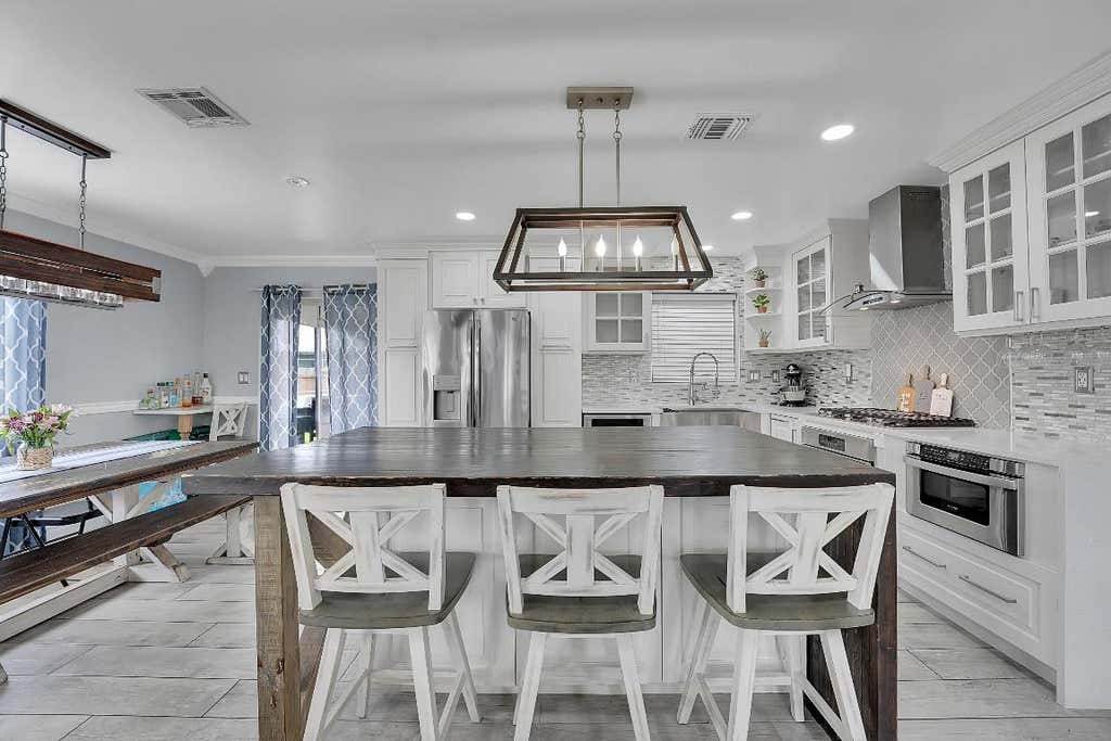 Photo of 4873 Pine Knott Lane, West Palm Beach, FL 33417 (MLS # R11110398)