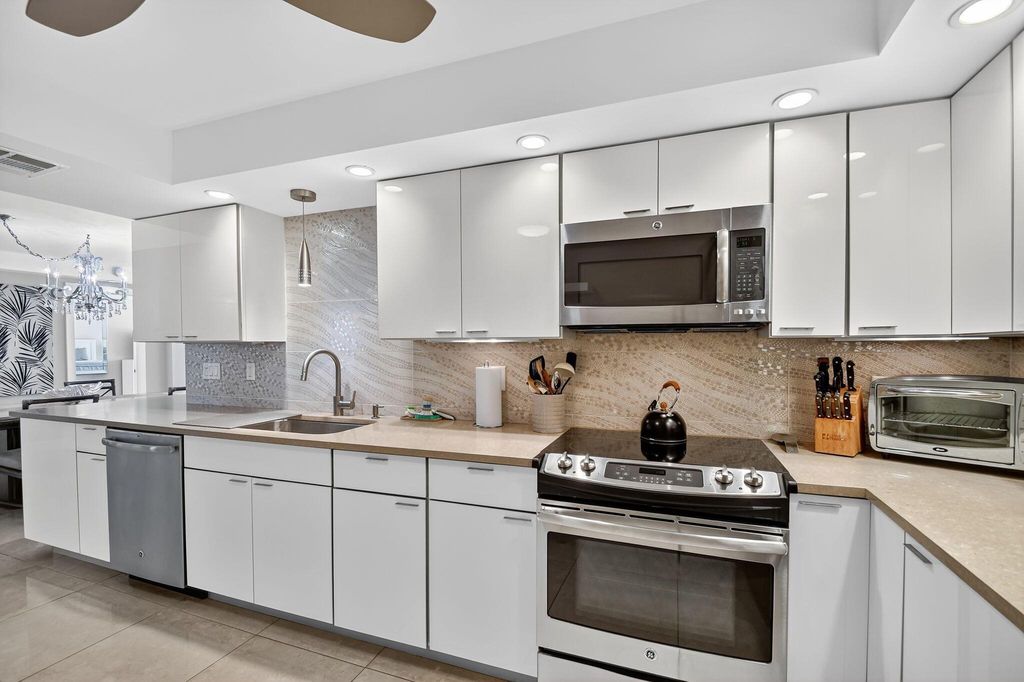 Photo of 3546 S Ocean Boulevard #404, South Palm Beach, FL 33480 (MLS # R11119761)