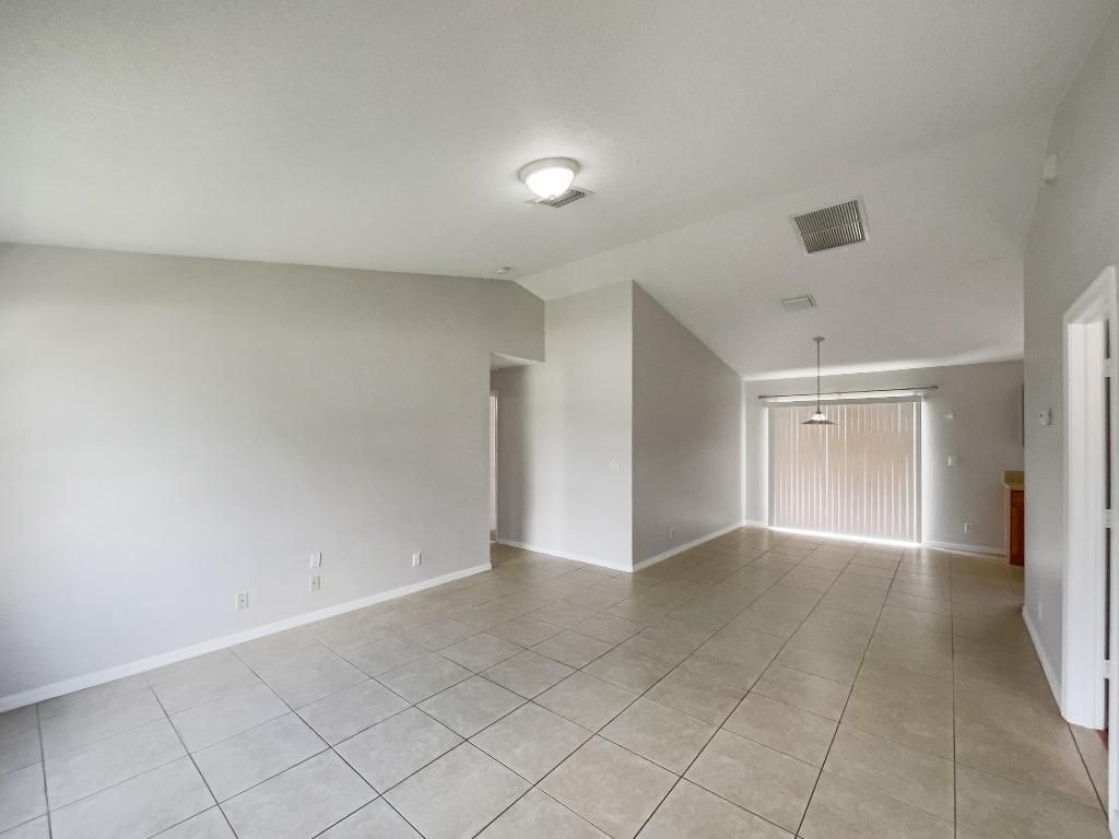 Photo of 4426 SW Cacao Street, Port Saint Lucie, FL 34953 (MLS # R10959347)