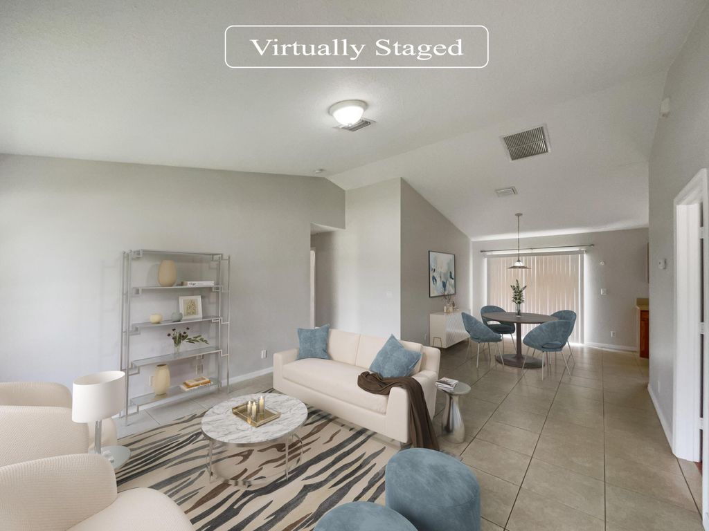 Photo of 4426 SW Cacao Street, Port Saint Lucie, FL 34953 (MLS # R10959347)