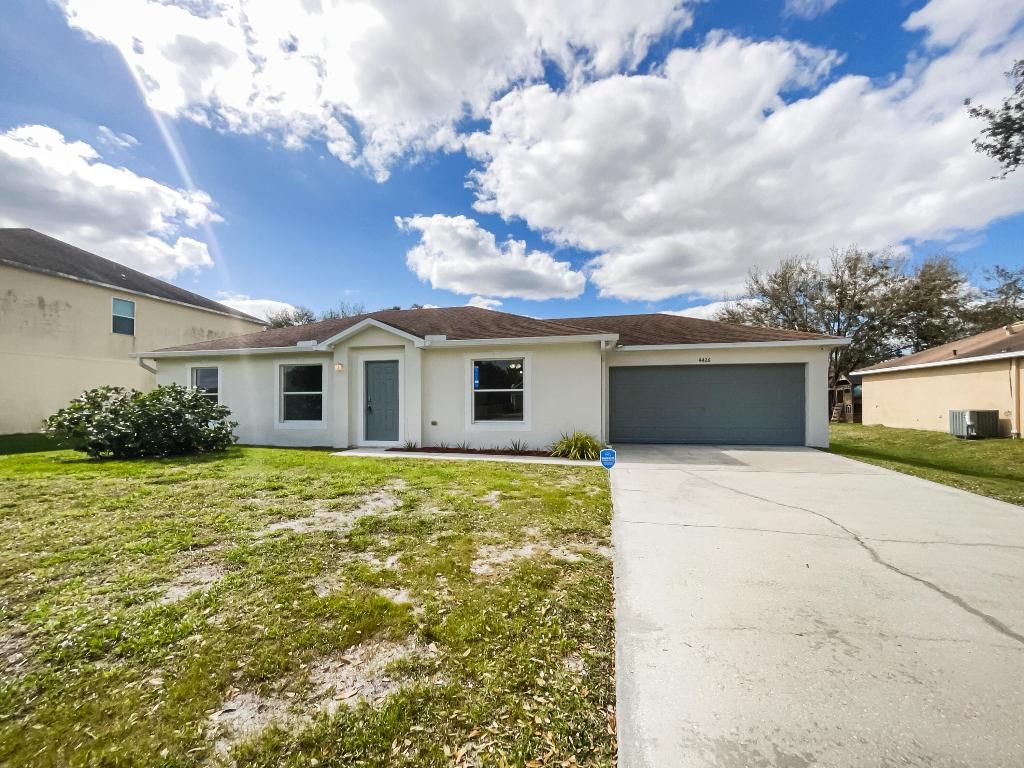 Photo of 4426 SW Cacao Street, Port Saint Lucie, FL 34953 (MLS # R10959347)