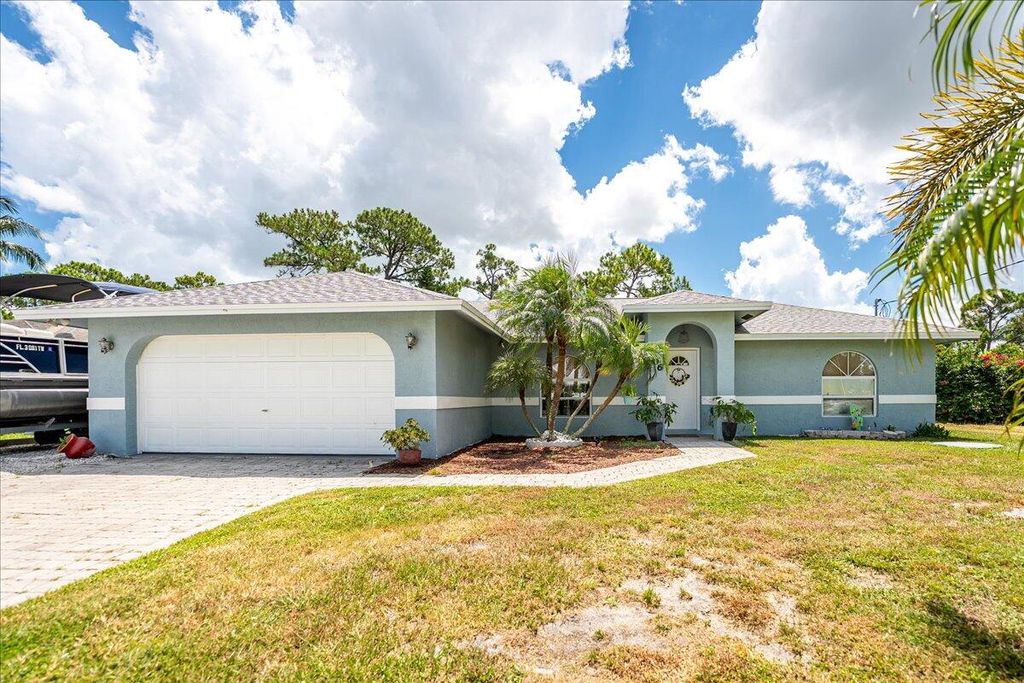 Photo of 106 SE Crosspoint Drive, Port Saint Lucie, FL 34983 (MLS # R11140653)