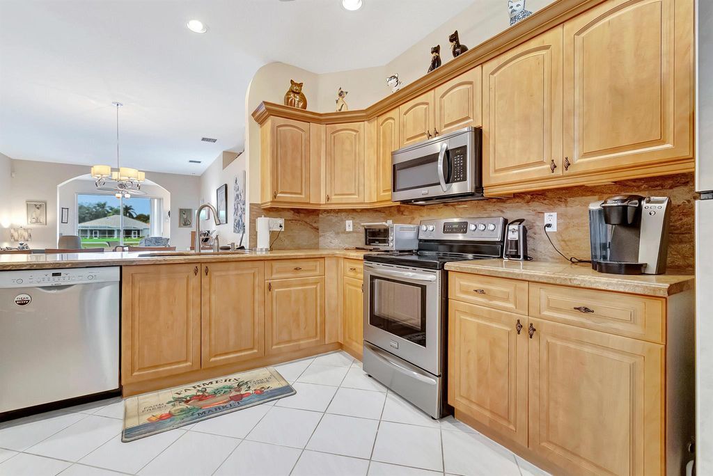 Photo of 10725 Royal Caribbean Circle, Boynton Beach, FL 33437 (MLS # R10926459)