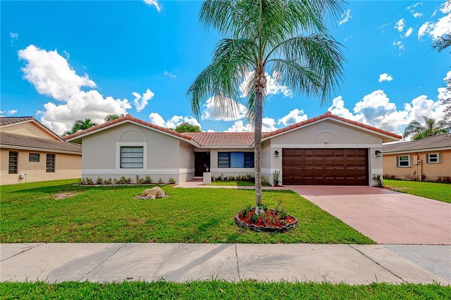 WOW !! THIS HOUSE IS THE ONE !! NO EXPENSE HAS BEEN SPARED !! COMPLETELY REMODELED HOME DONE RIGHT WITH ALL PLUMBING, ELECTRICAL, AND STRUCTURAL PERMITS !! STUNNING PORCELAIN TILE FLOORS THROUGHOUT ! HUGE OPEN FLOORPLAN GREAT FOR ENTERTAINING ! GORGEOUS EAT IN KITCHEN W/ NEW WOOD CABINETS, TOP OF LINE SS APPLIANCES, CUSTOM QUARTZ COUNTERS , MARBLE BACKSPLASH , & PANTRY ! HUGE FORMAL DINING ROOM ! 2 BRAND NEW BATHROOMS W/CUSTOM TILES,  WOOD CABINETS, QUART COUNTERS & AMAZING LIGHT UP MIRRORS ! NEW PAINT INSIDE AND OUT ! NEW LED HIGH HAT LIGHTING THROUGHOUT ! NEW WINDOW TREATMENTS ! CONVENIENT LAUNDRY ROOM INSIDE HOUSE ! HUGE SCREENED PATIO W/ GREAT PRIVATE LARGE YARD ! RAINBIRD SPRINKLER SYSTEM ! NEW S-TILE ROOF 2016 ! 2 CAR GARAGE W/ LARGE DRIVEWAY ! NO HOA ! NO HOA ! THIS IS A MUST SEE ! BEAUTIFUL 4 BEDROOM 2 BATH HOME !!