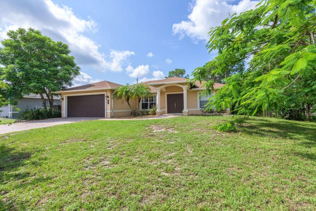 Photo of 498 SW Laconic Avenue SW, Port St Lucie, FL 34953 (MLS # R10900566)