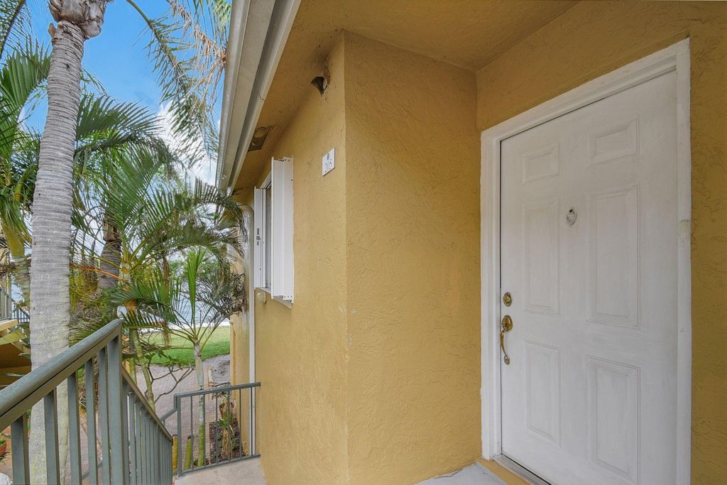 Photo of 1155 Lake Shore Drive #205, Lake Park, FL 33403 (MLS # F10485685)