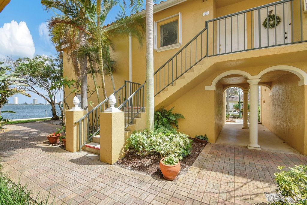 Photo of 1155 Lake Shore Drive #205, Lake Park, FL 33403 (MLS # F10485685)