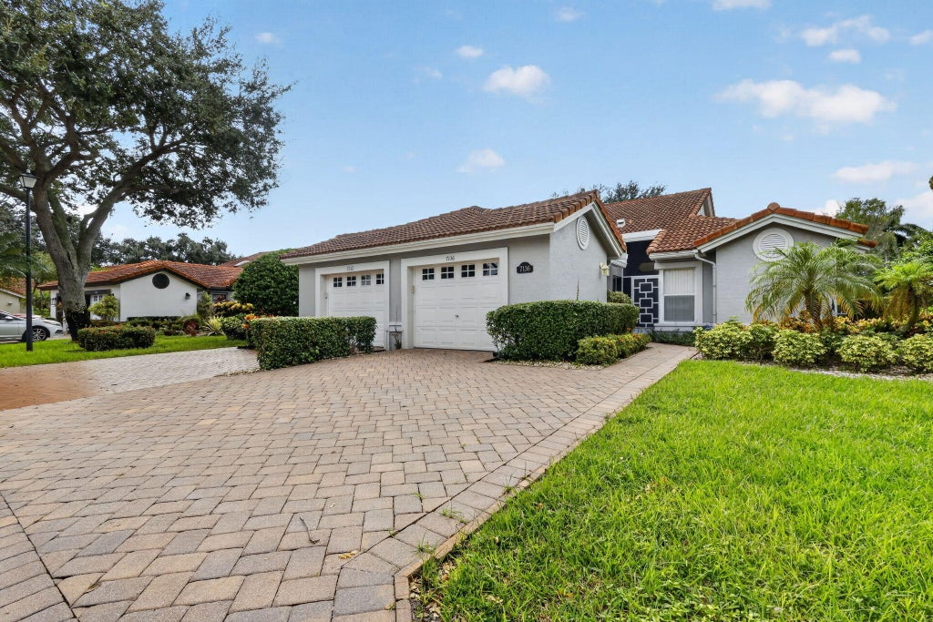 Photo of 7136 Summer Tree Drive, Boynton Beach, FL 33437 (MLS # B26083315)
