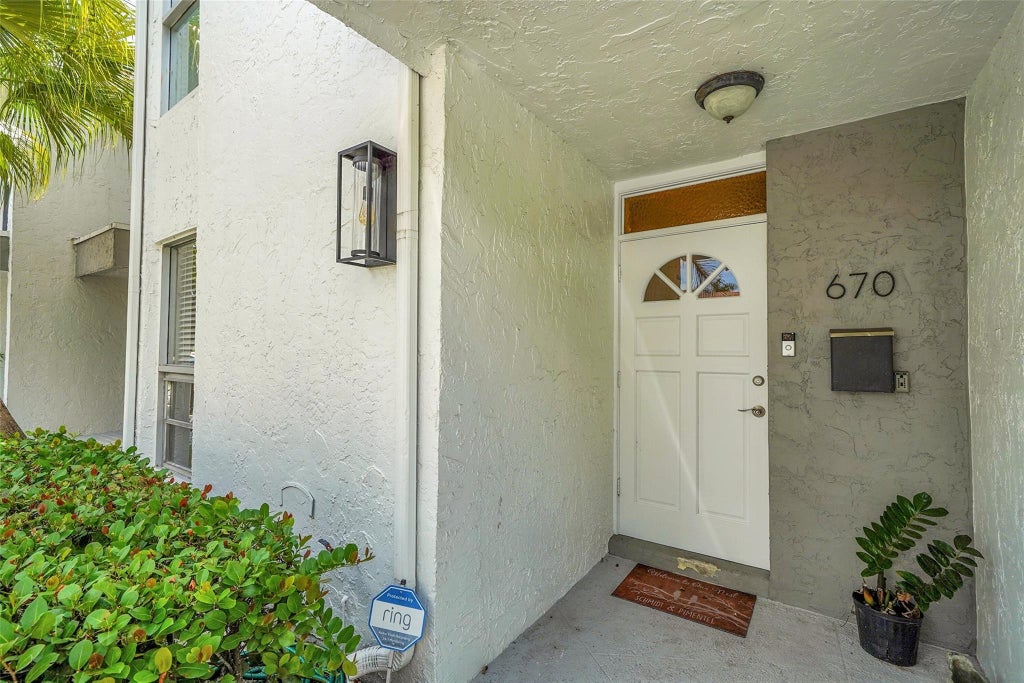 Photo of 670 Kensington Place, Wilton Manors, FL 33305 (MLS # B26057804)