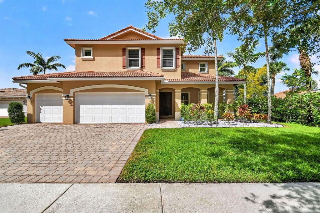 Photo of 9070 WINTERHAVEN Circle, West Palm Beach, FL 33411 (MLS # B26085476)