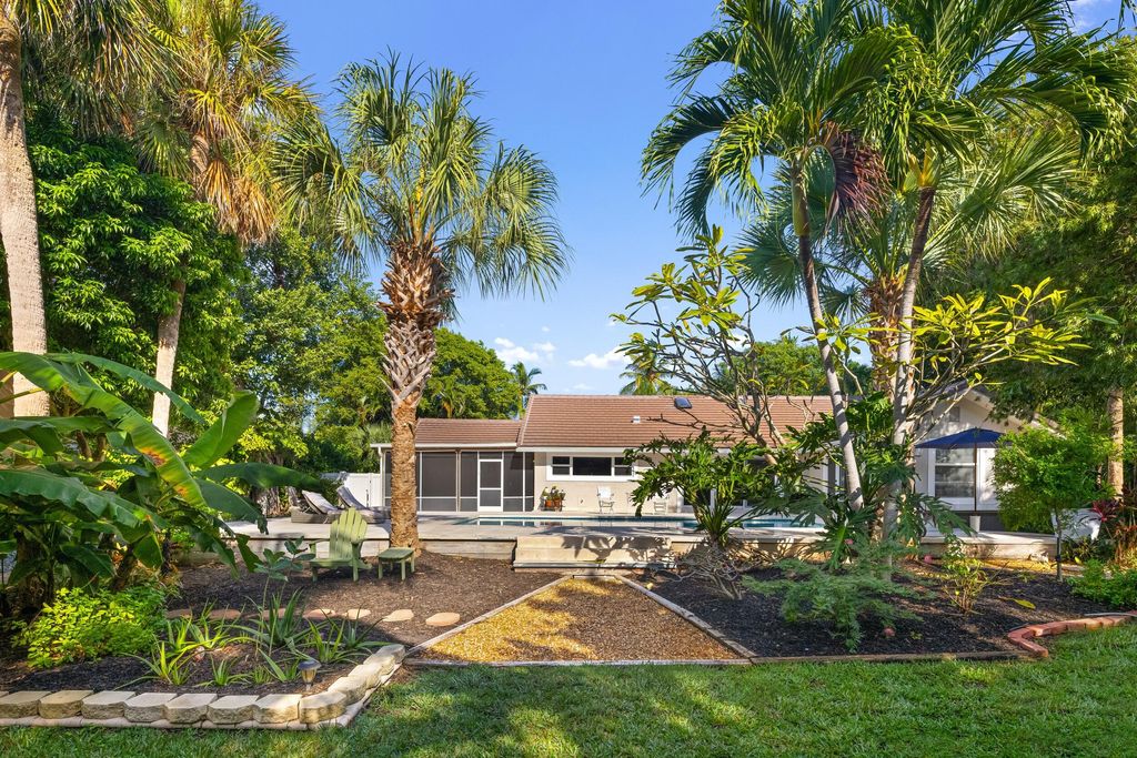 Photo of 41 Coconut Lane, Ocean Ridge, FL 33435 (MLS # R11143598)