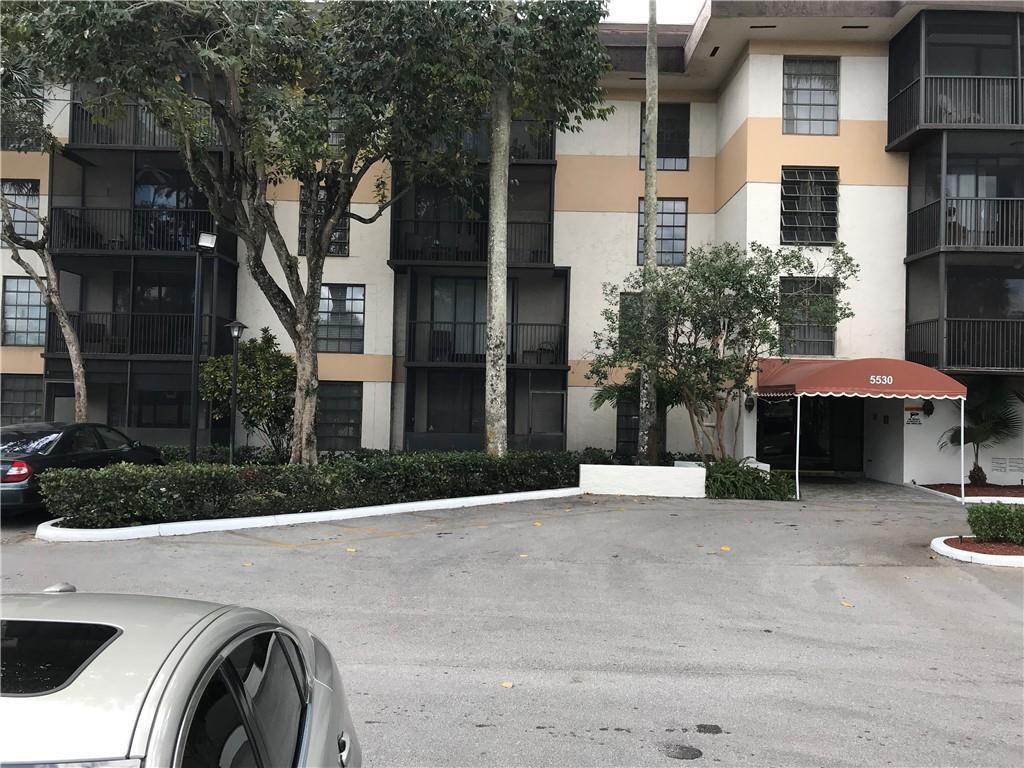 Photo of 5530 NW 44th Street #211c, Lauderhill, FL 33319 (MLS # B26049217)