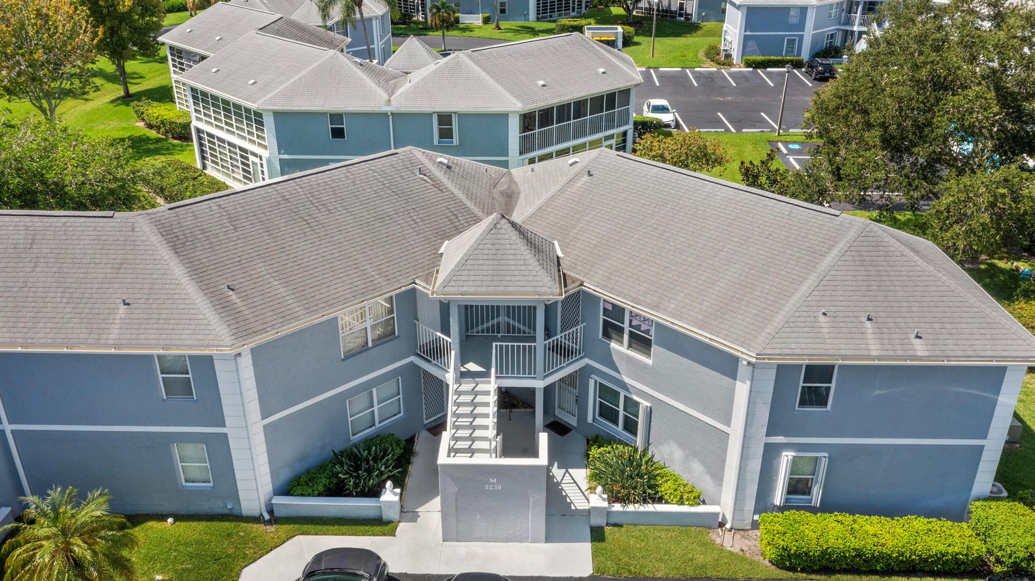 BEAUTIFULLY UPDATED 2-Bedroom Condo Designed for Relaxed Florida Living!This immaculate 1200 sq. ft,  2-bedroom, 2-bath home offers comfort, style and peace of mind with quality upgrades throughout. Each bedroom features its own private en-suite retreat with custom vanities, upgraded tile showers, and stylish lighting. The open kitchen offers modern cabinetry, gleaming granite countertops, a range of newer appliances, perfect for cooking or entertaining friends. Enjoy the comfort of FULL IMPACT-TINTED WINDOWS (2021), a screened security door, and cool, spotless tile floors throughout. Located in a friendly, all-ages, pet-welcoming community with a sparkling pool and tennis court, this move-in-ready condo blends modern upgrades with the easy, carefree lifestyle you've been dreaming of!