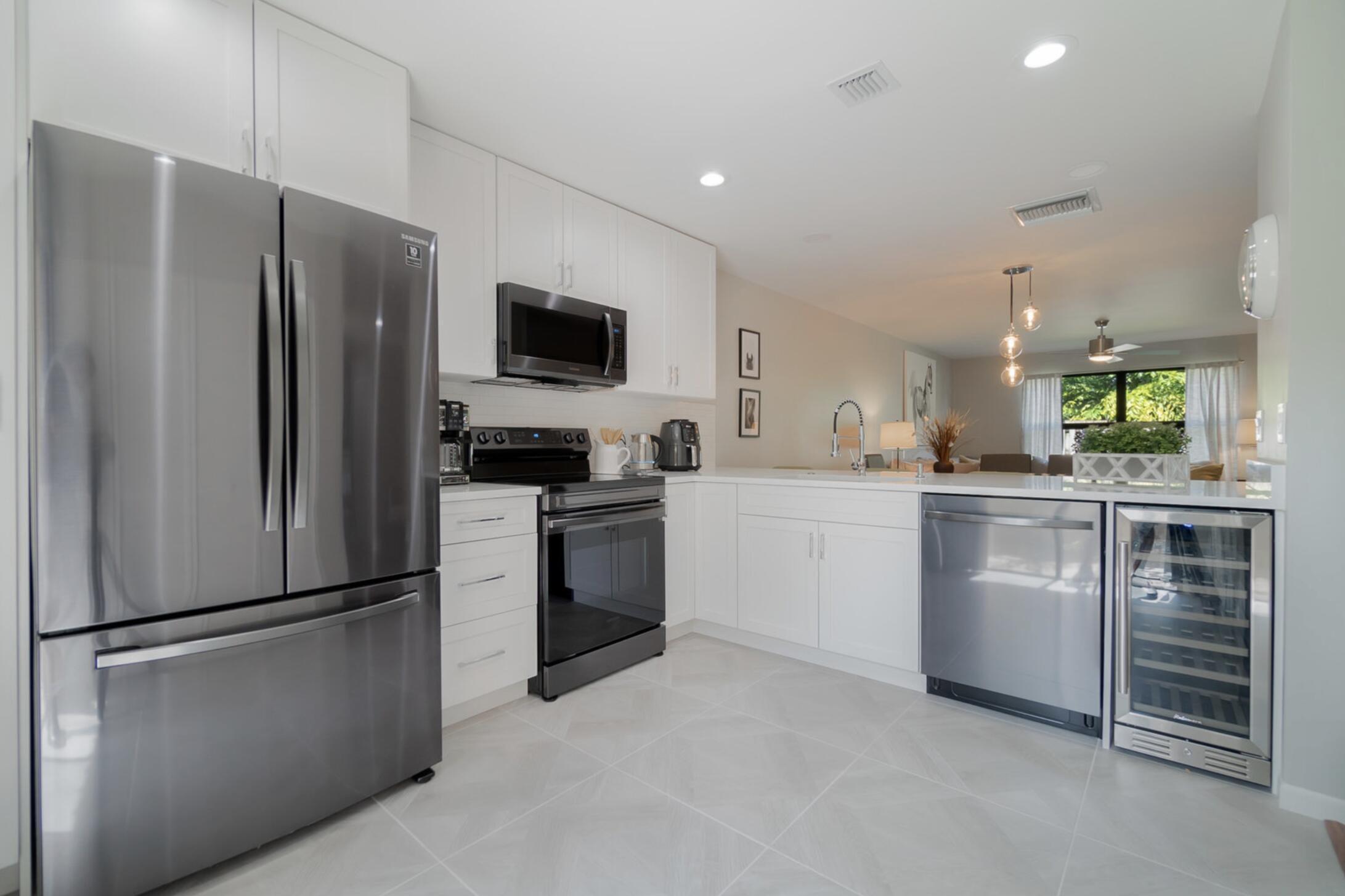 SHEFFIELD WOODS AT WELLINGTON CONDO - Residential Lease