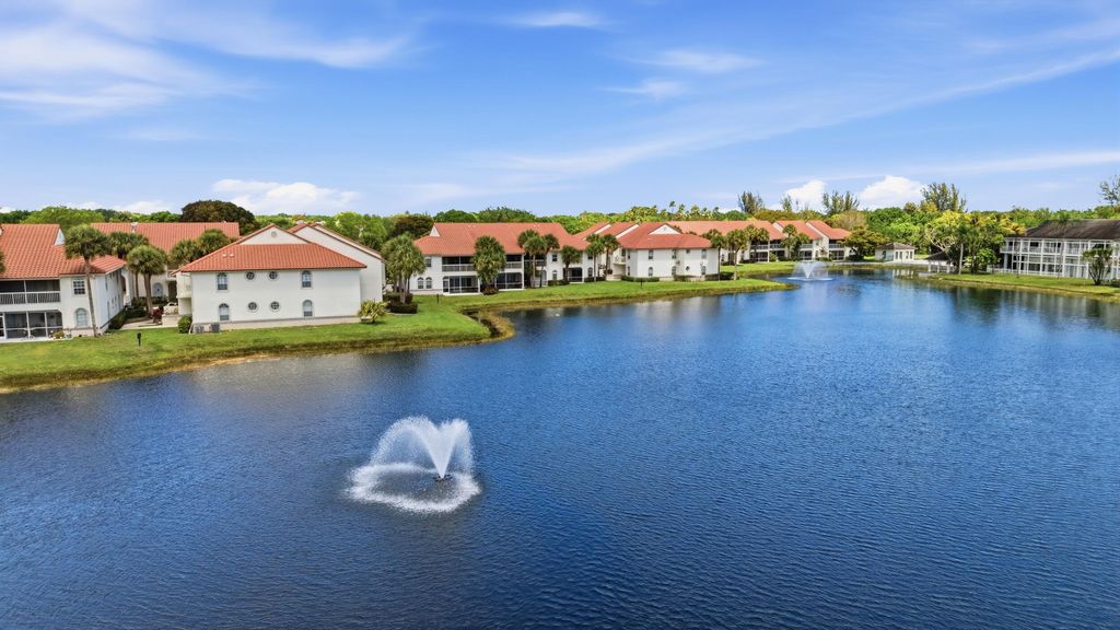 Photo of 115 Cypress Point Drive, Palm Beach Gardens, FL 33418 (MLS # B26015155)