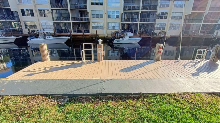 Wake up to peaceful water views from this top-floor waterfront condo in desirable Pompano Beach. Enjoy your morning coffee as boats glide by, knowing your own DEEDED DOCK is just steps away—perfect for effortless boating days and sunset cruises. This tranquil retreat offers the rare combination of privacy, views, and direct water access, making it an ideal coastal escape or full-time residence.Resort-style amenities span over five beautifully maintained acres, offering something for everyone. Residents enjoy two heated pools, hot tub, sauna, fitness center, billiard room, outdoor ping pong, playground, barbecue area, and a function hall ideal for gatherings. The community is gated with 24-hour manned security, providing both comfort and peace of mind.