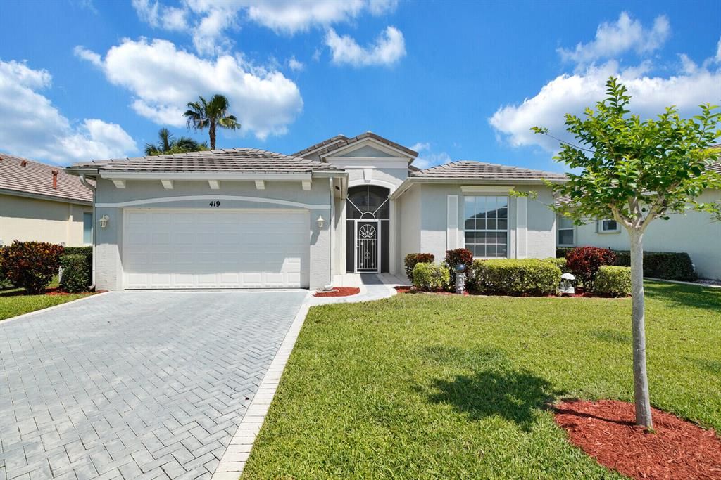 Photo of 419 SW Talquin Lane, Saint Lucie West, FL 34986 (MLS # R10709141)