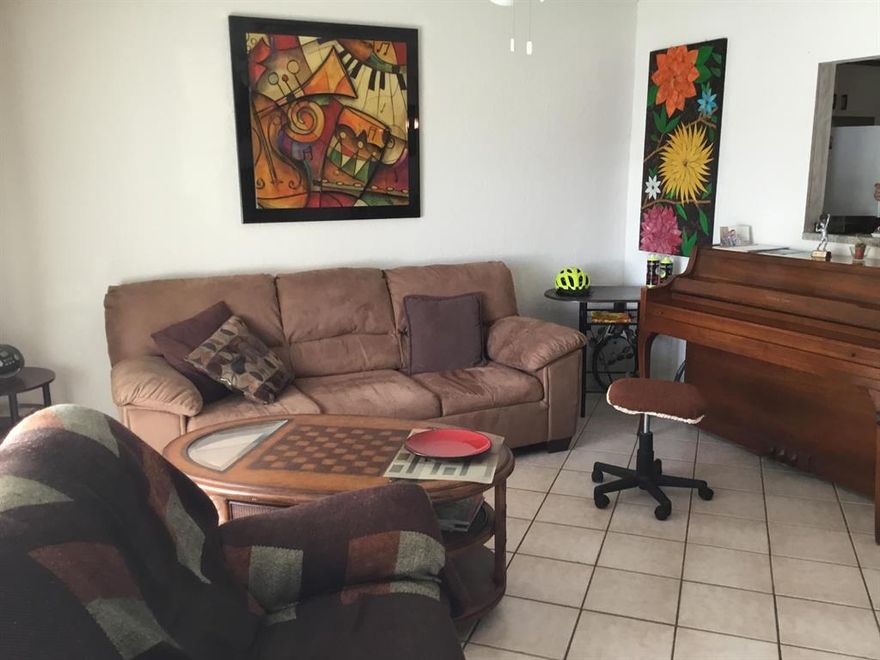 :55 AND OVER COMMUNITY. Absolutely gorgeous large one bedroom condo with one and a half baths with CENTRAL AIR near the east gate. Fully updated. Being sold partially furnished or unfurnished. Community is gated with 24 hour security. Amenities include free basic cable, 1,201 seat theater, fitness center, 17 swimming pools, fishing, boating, on and offsite free transportation, barber/beauty salon, Walgreen's Drug Store and lots of things to do and clubs. A must see and won't last long