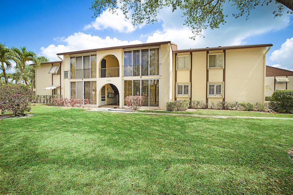 Photo of 138 Lake Pine Circle #D-1, Greenacres, FL 33463 (MLS # R11077981)