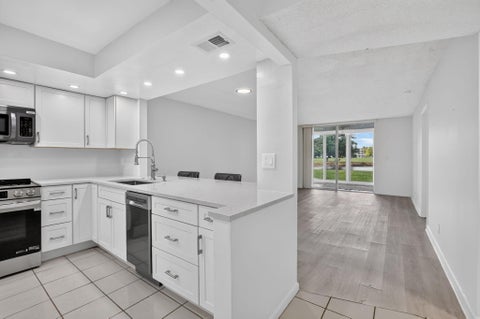 Photo of 1700 NW 80th Avenue #104, Margate, FL 33063 (MLS # B26043206)
