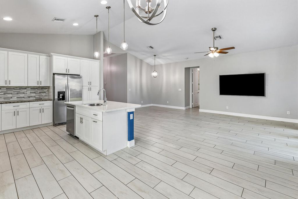 Photo of 1925 SW Michelangelo Avenue, Port Saint Lucie, FL 34953 (MLS # B26023403)