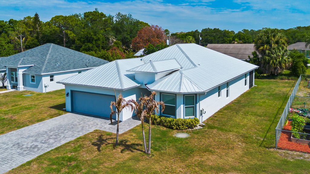 Photo of 1925 SW Michelangelo Avenue, Port Saint Lucie, FL 34953 (MLS # B26023403)