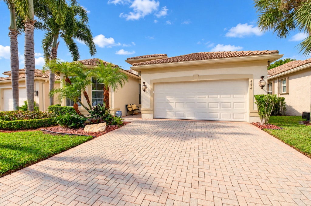 Photo of 6874 Venidita Beach Drive, Delray Beach, FL 33446 (MLS # B26094115)
