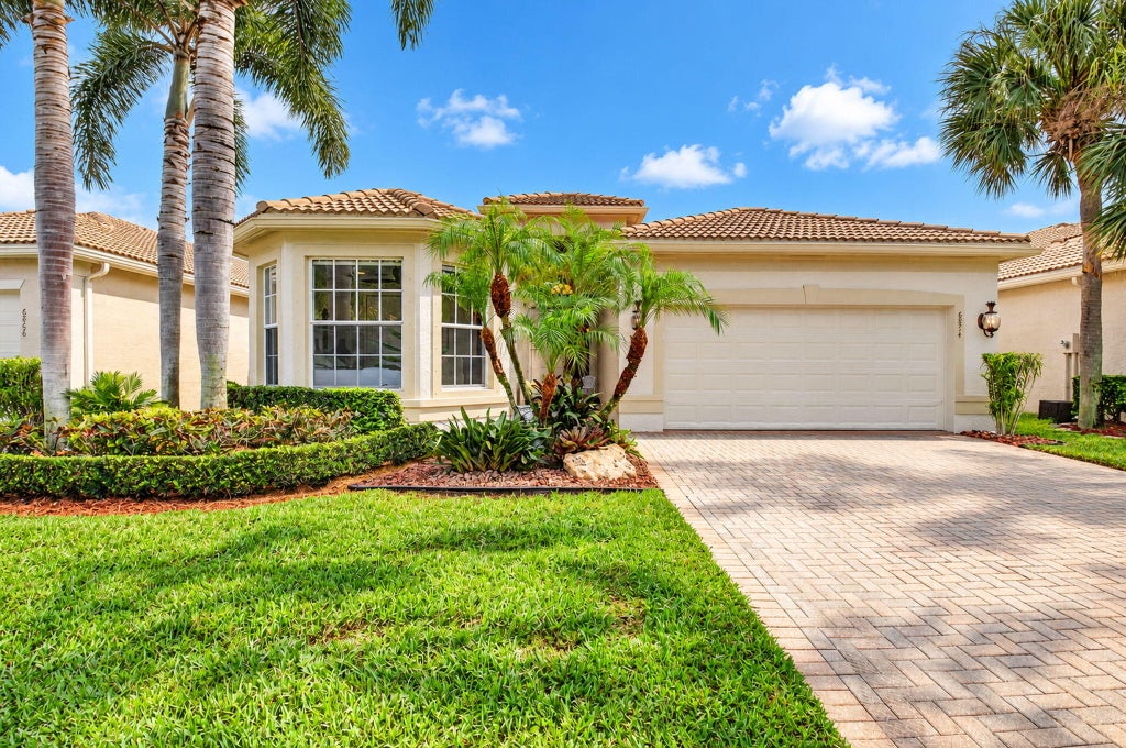 Photo of 6874 Venidita Beach Drive, Delray Beach, FL 33446 (MLS # B26094115)