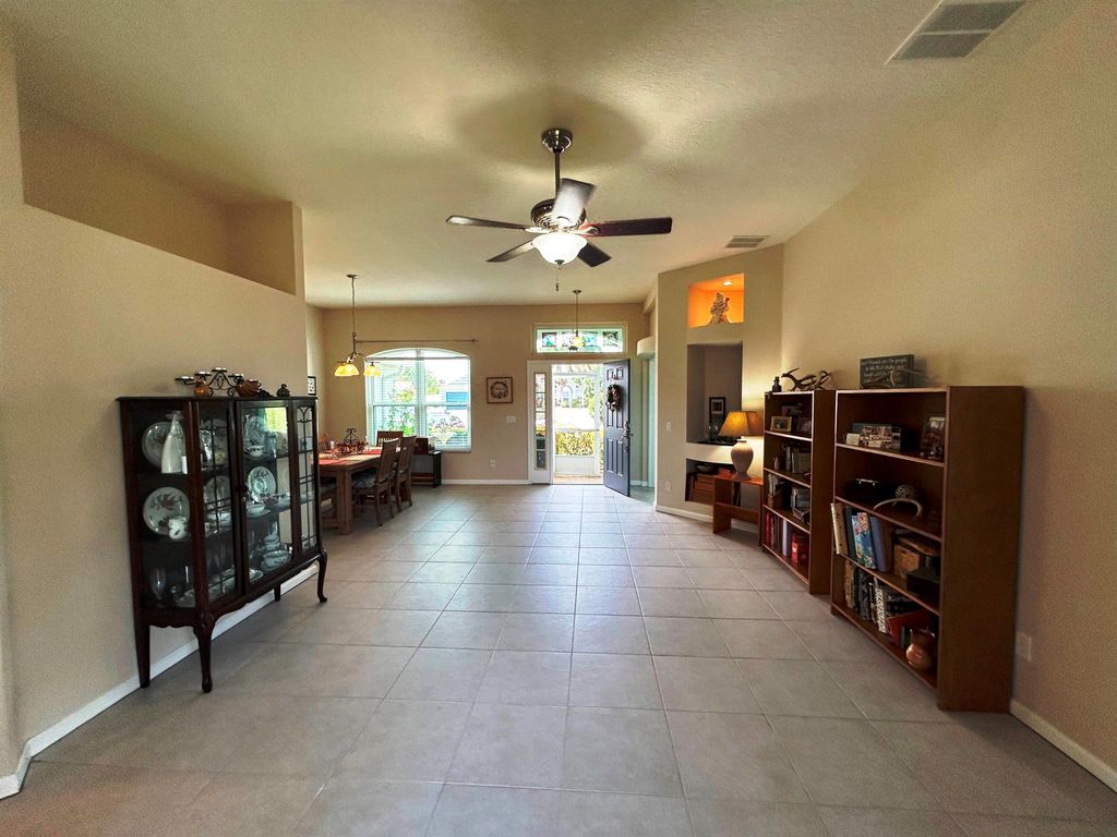 Photo of 563 SW Crawfish Drive, Port Saint Lucie, FL 34953 (MLS # R10975080)