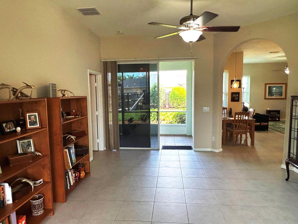 Photo of 563 SW Crawfish Drive, Port Saint Lucie, FL 34953 (MLS # R10975080)