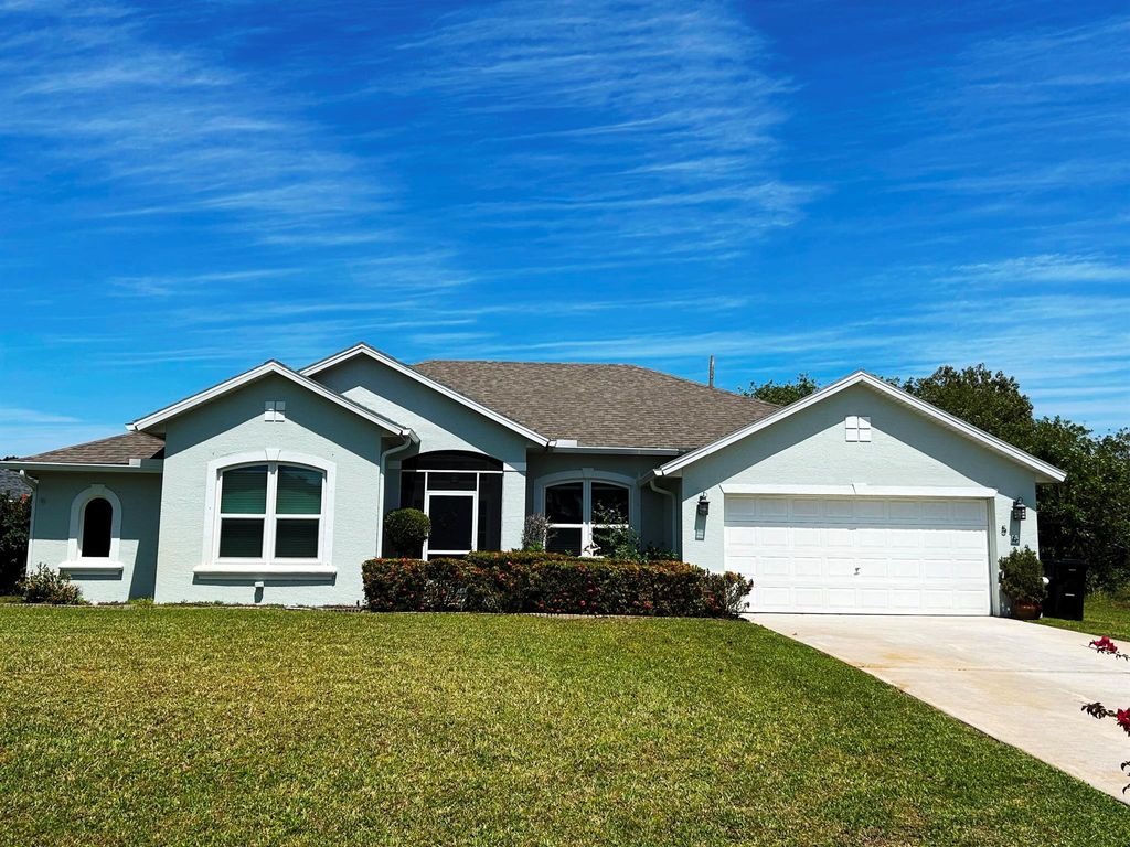 Photo of 563 SW Crawfish Drive, Port Saint Lucie, FL 34953 (MLS # R10975080)